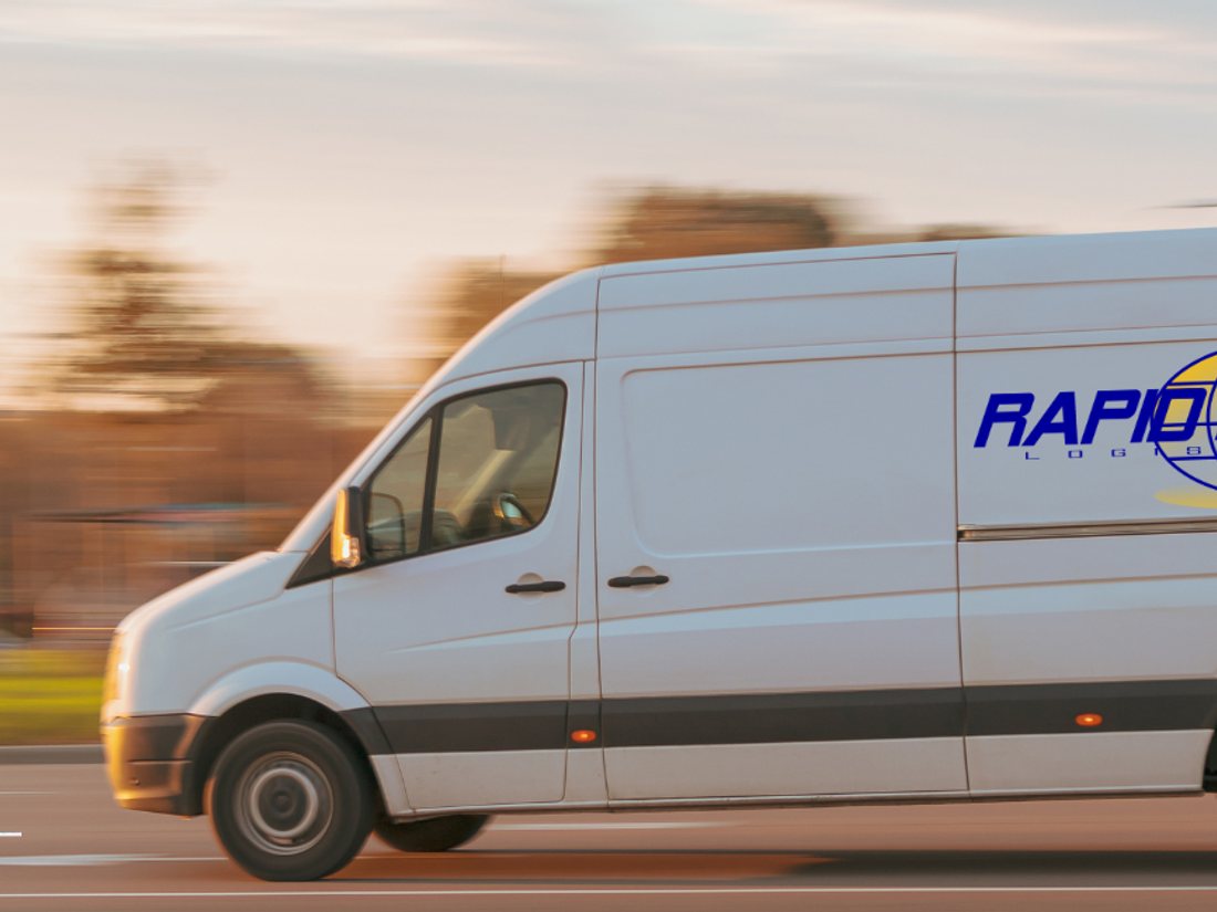 Delivery van moving through the city