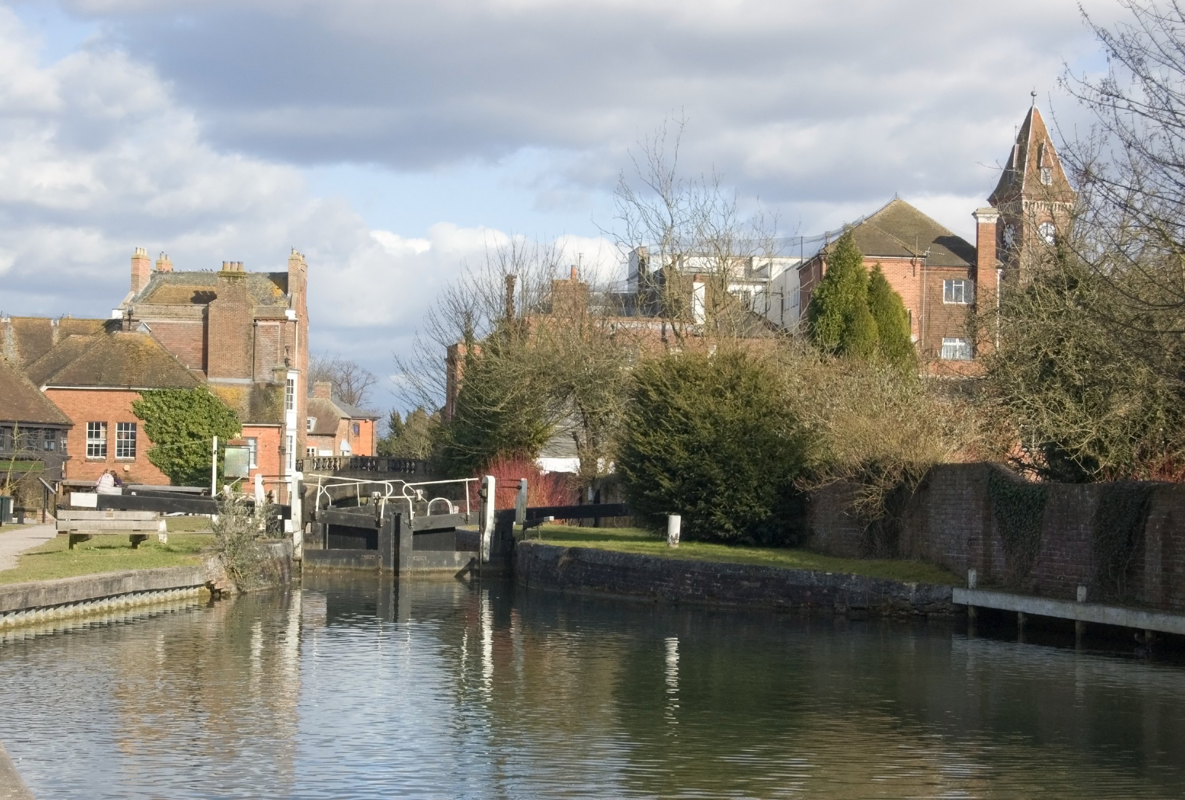 The canal and lock at Newbury, with the church behind
